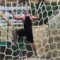Guy climbing the net rope Pacific Fibre and Rope